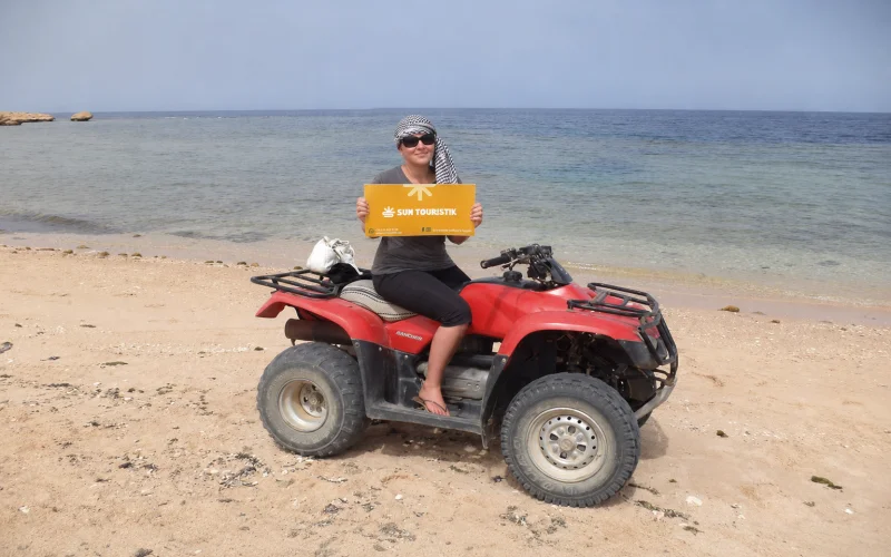 Beach quad biking Hurghada Red Sea shoreline sunset